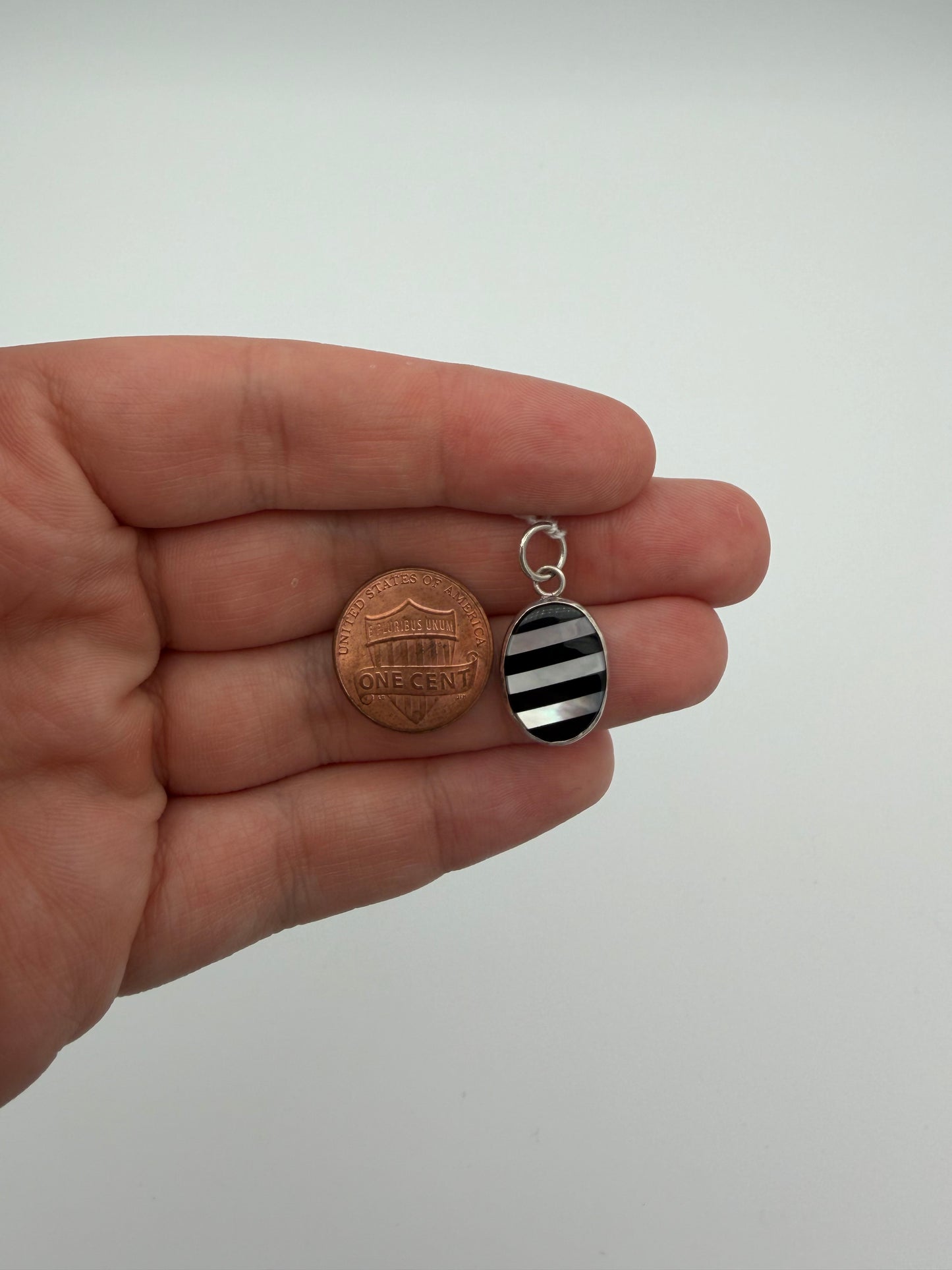 Onyx and Mother of Pearl Stripe Charm